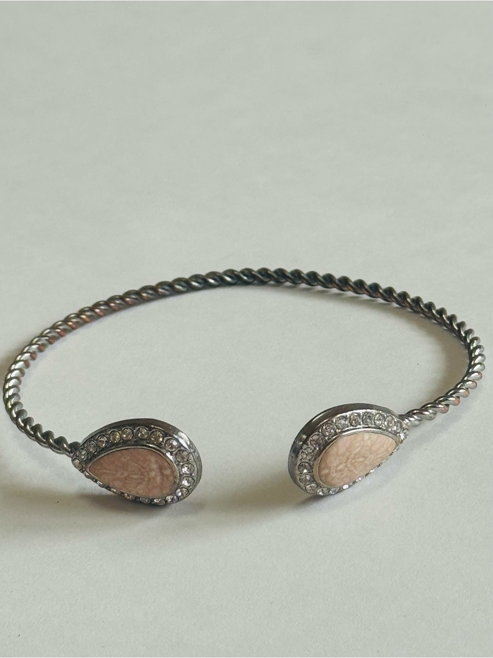 Jilzarah Silver-Tone Twist Cuff Bracelet with Pink Cameo Accents